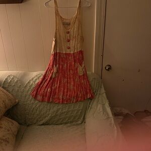 Sleeveless Cream and Pink Floral Dress with Pleated Skirt